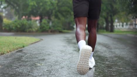 man running in the rain