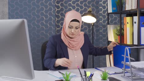 desperate business woman in hijab.