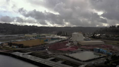 Aerial-circling-shot-of-mill-company-for-wood-and-paper-products