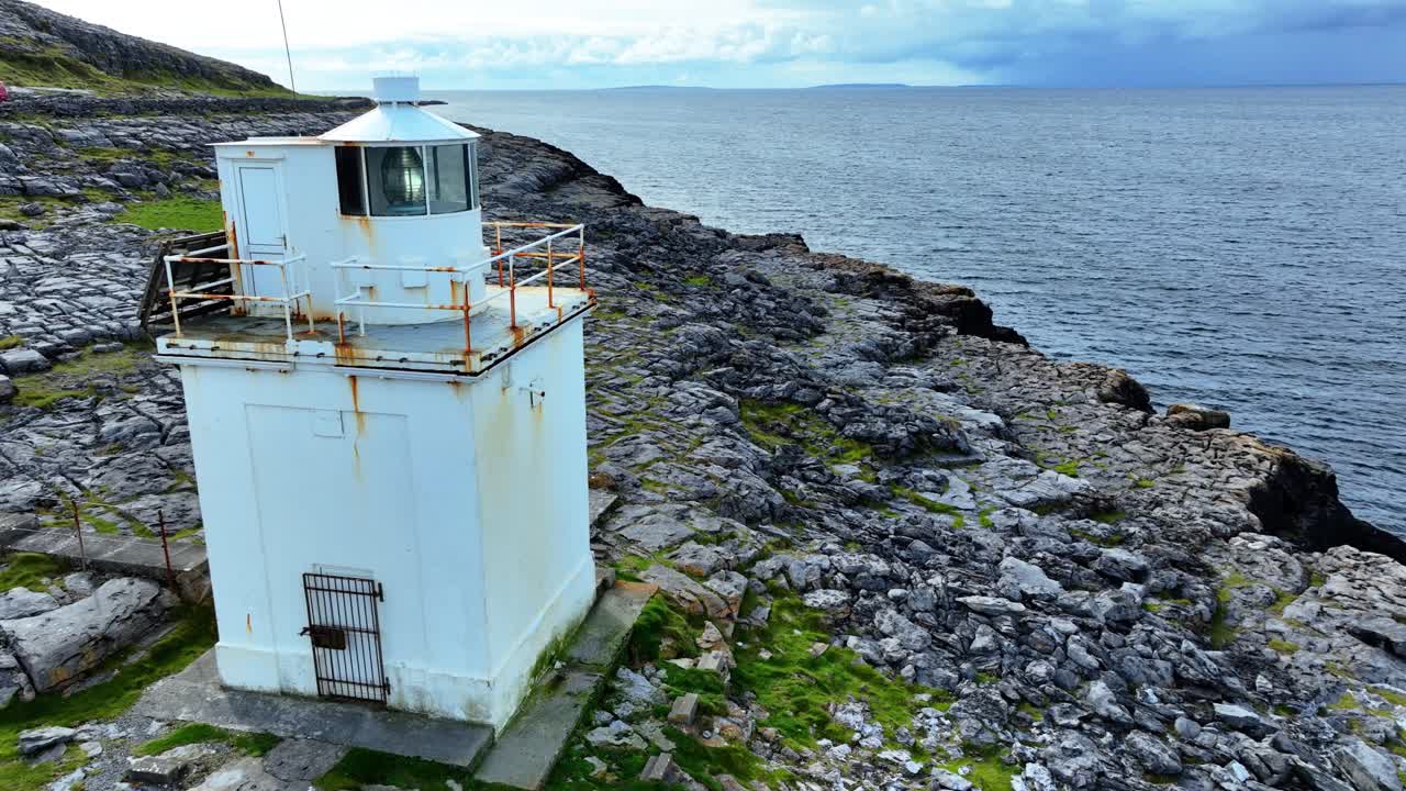 Ireland Epic Locations drone closeup Black Head lighthouse on the coast of Galway Bay The Burren Co Clare on the wild Atlantic way coastal route