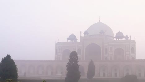 humayun tomb at misty morning from unique perspective shot is taken at delhi india