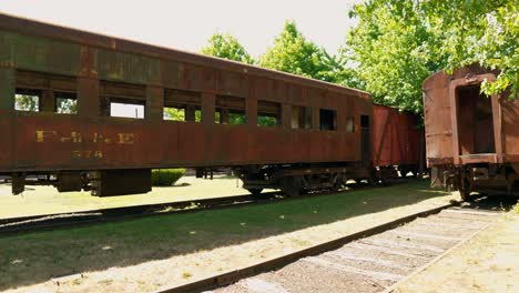 panning to right panoramic view of the old and out-of-use locomotive at the railway museum in temuco, chile