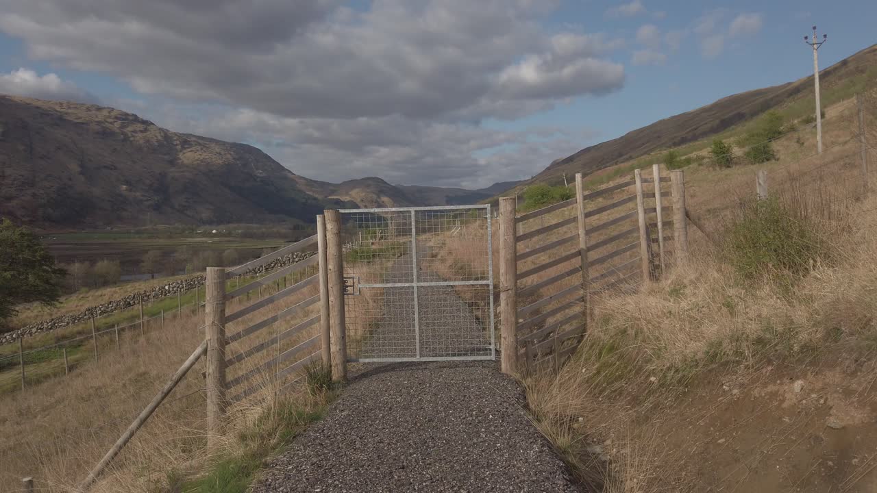 A closed gate on a walking trail in Cairndow