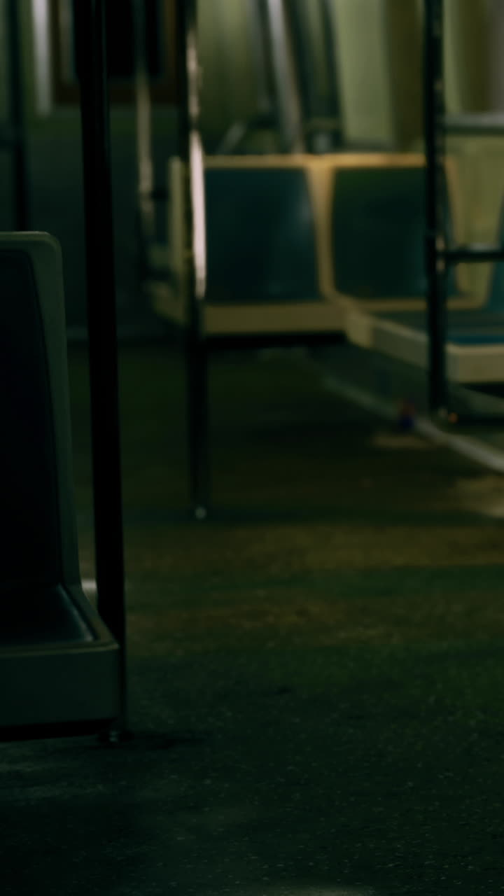 Empty subway car during late night hours in a city setting