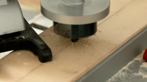 circular hole saw drill bit in action, close-up