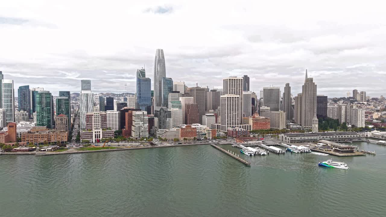 San Francisco Cityscape Skyline, Drone Shot of Financial District Skyscrapers and Embarcadero Traffic From Bay, California USA