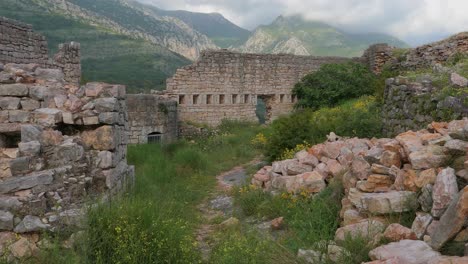 walking through old ruins and fortress by the mountains, southern europe