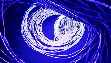 abstract spiral of glowing blue light