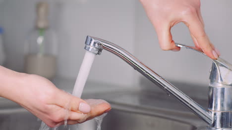 Man-Washing-Hands-In-Sink-Covid-19-2