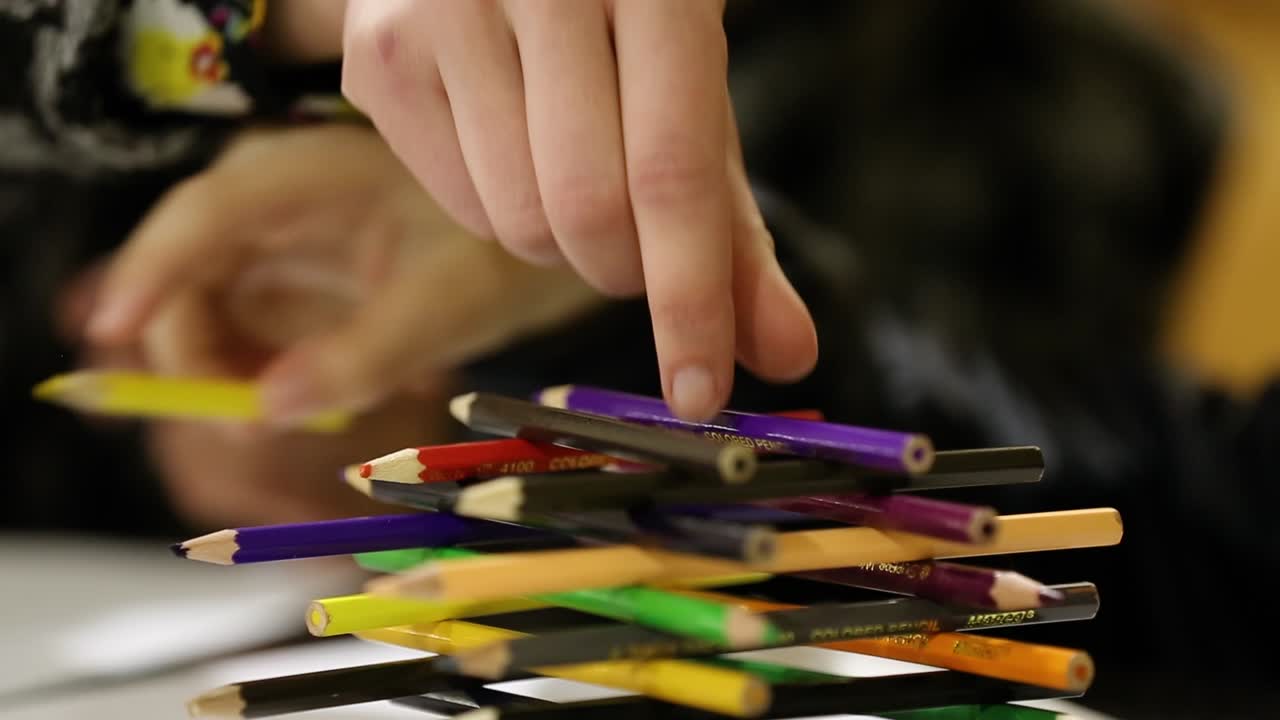 Child With Pencil In Play. Child preschooler with pencil in play room