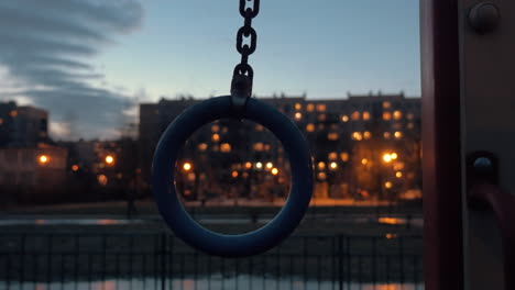 sports ring on apartment block background in late evening