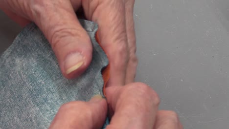 woman sewing close up hands