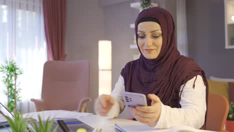 woman in hijab shopping online.