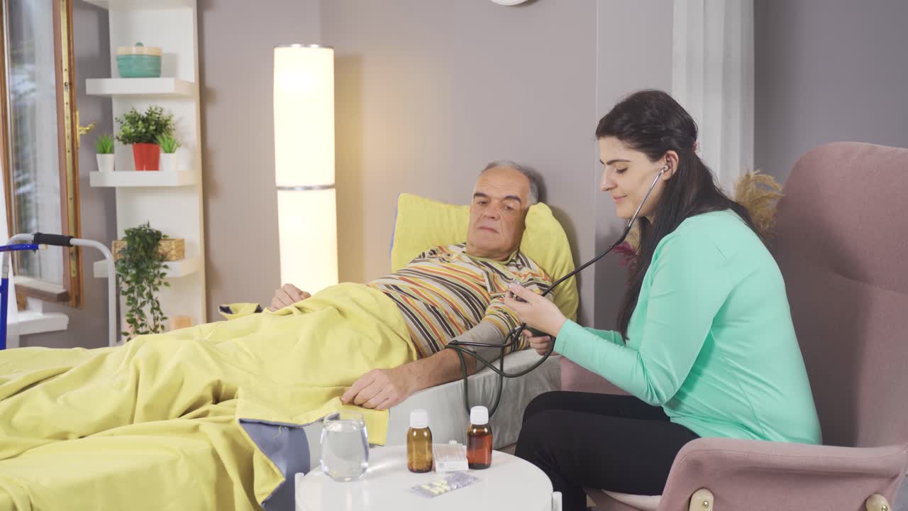The nurse measures the patient's blood pressure.