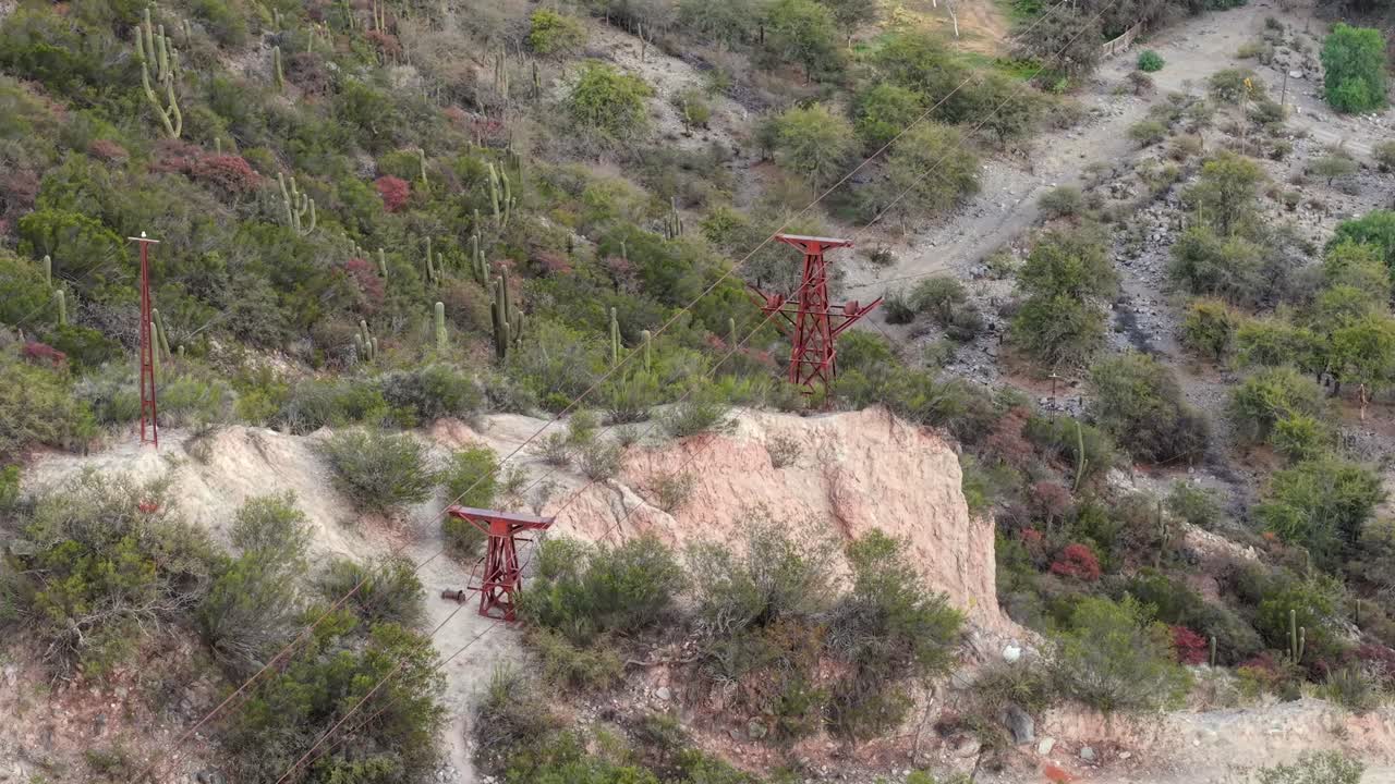Remains of Cable Carril’s railway pillars and ruins among hills and bushes in Chilecito, La Rioja, Argentina
