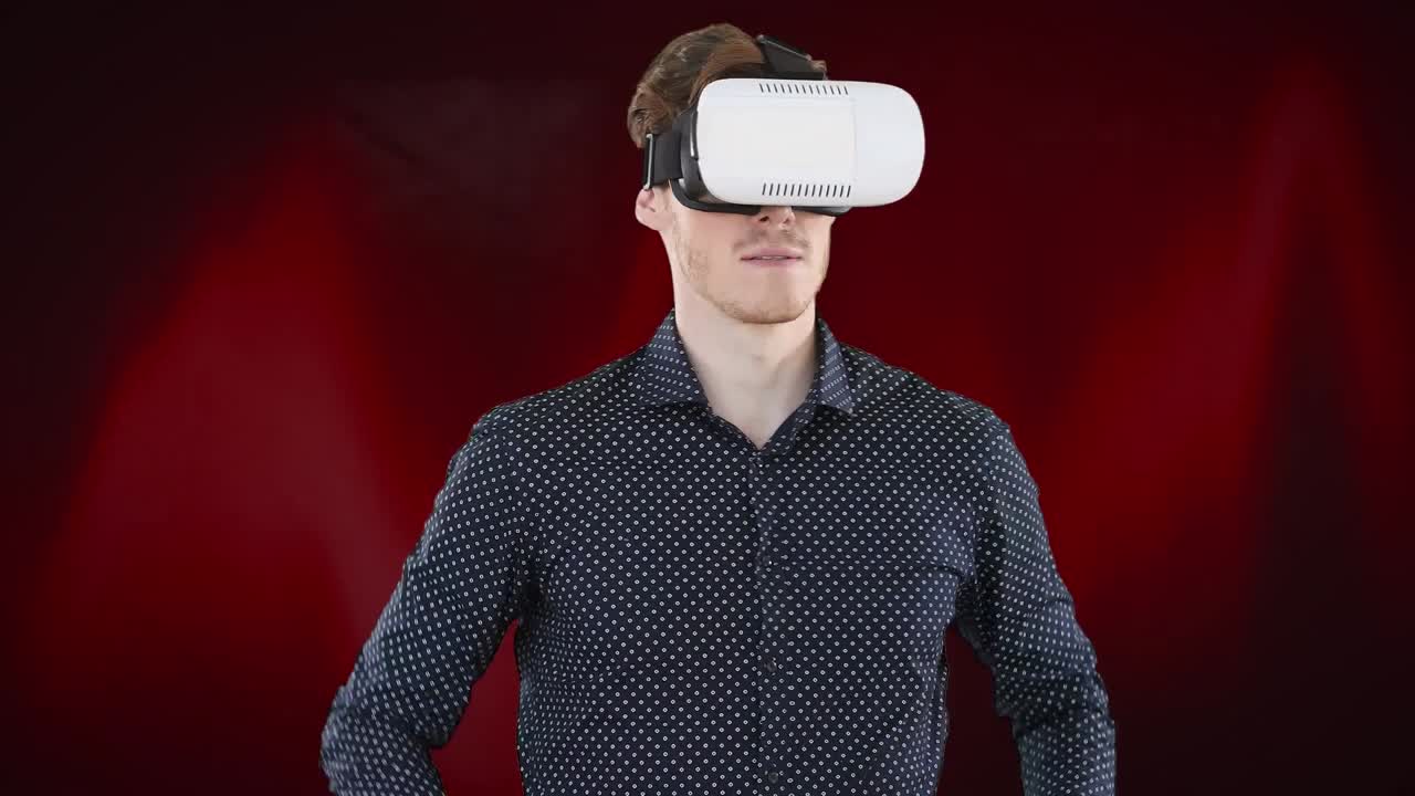 animazione di un uomo caucasico in cuffie vr utilizzando un'interfaccia virtuale, su uno sfondo rosso scuro