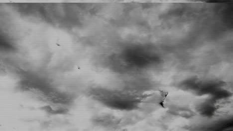 damaged television transmission of fast moving storm clouds