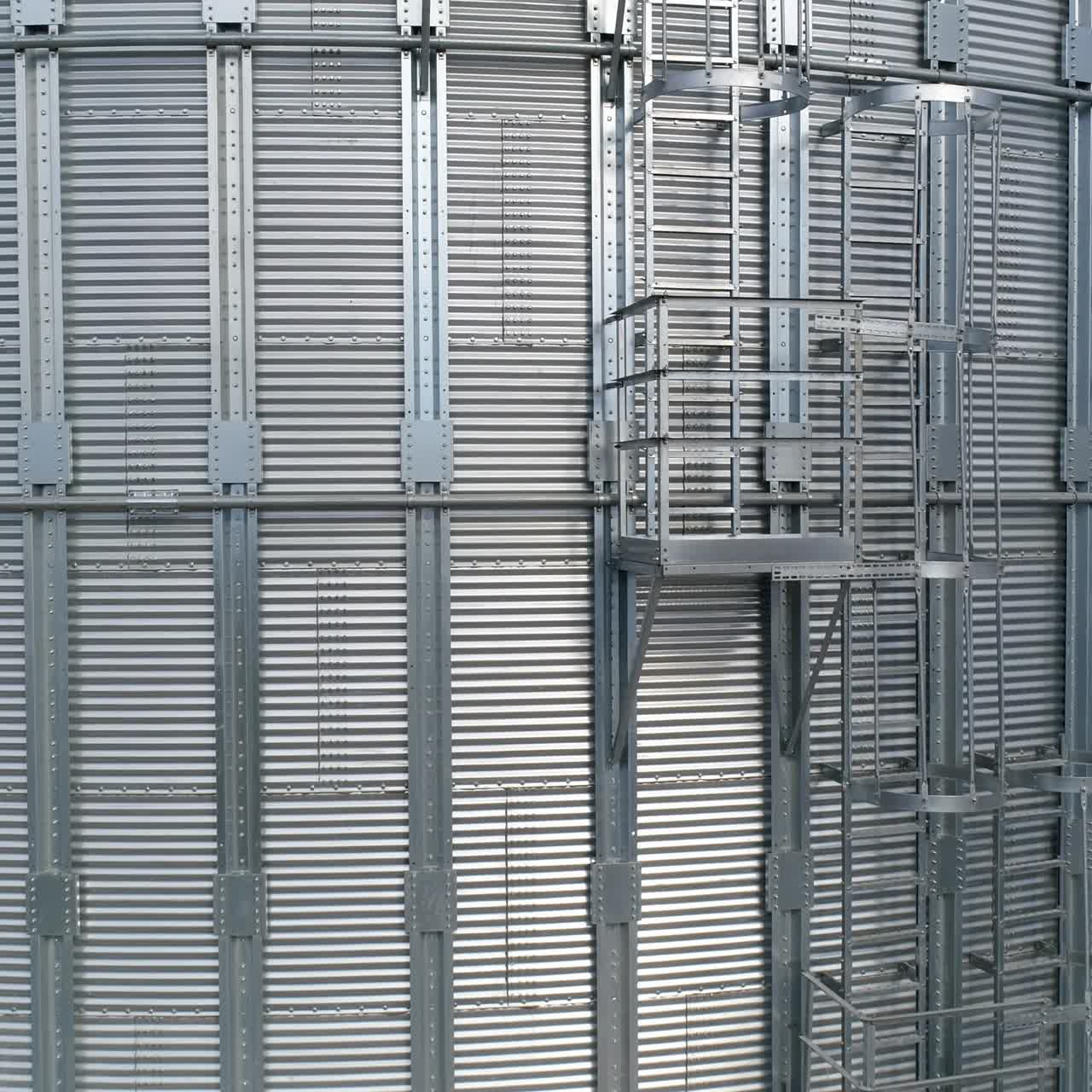 Metal grain industrial factory storage. Agricultural tank storehouse. Aerial view