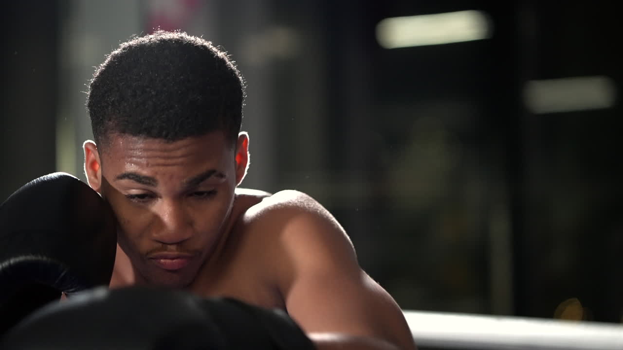 Young Boxer Training in the Ring