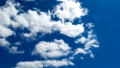 clouds are moving in the blue sky. timelapse