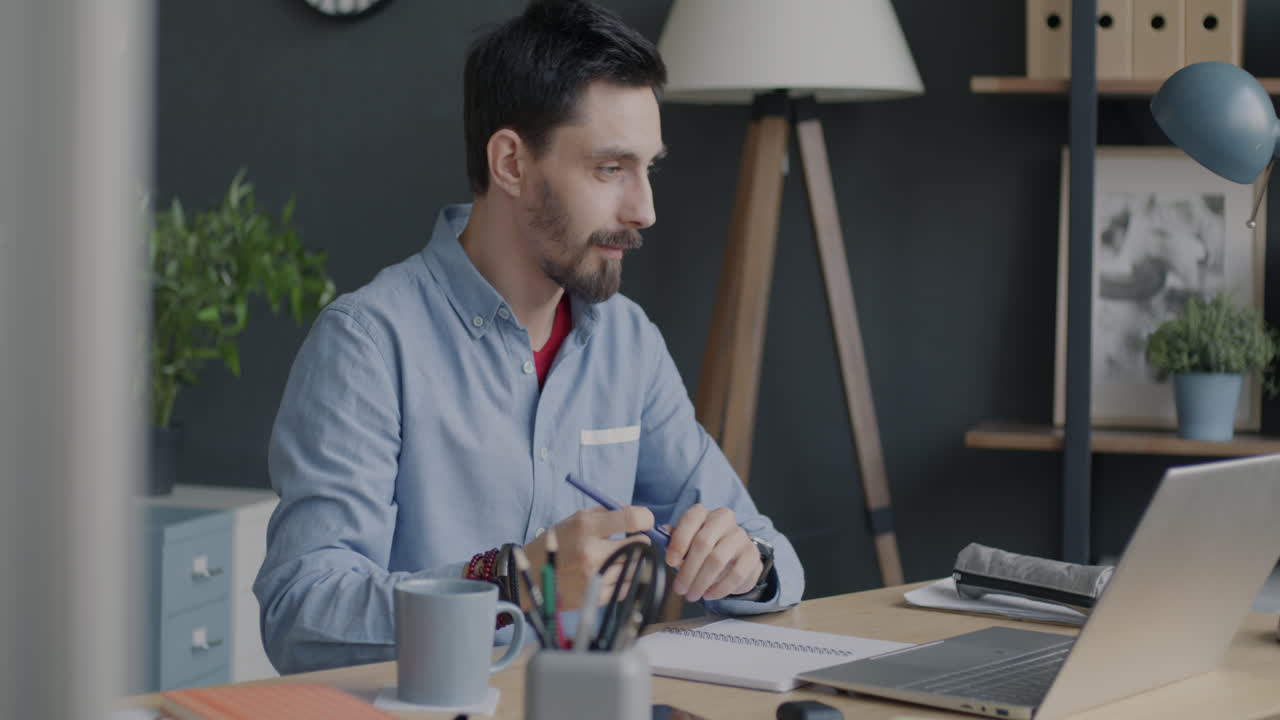 Man Working at Home or Office