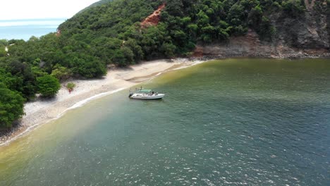 A-drone-shot-of-a-boat-anchored-in-a-cove-7-miles-off-the-Venezuela-coastline-located-in-Trinidad-and-Tobago