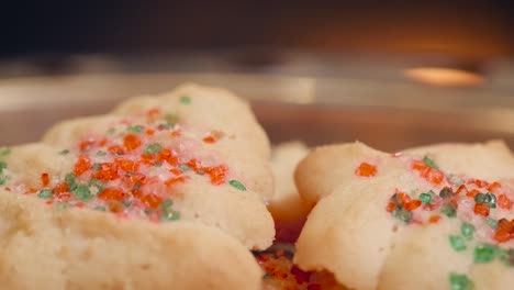 christmas cookies for santa on a plate in front of a fireplace in 4k