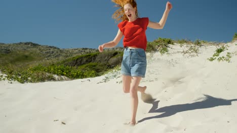 woman playing in the beach on a sunny day 4k