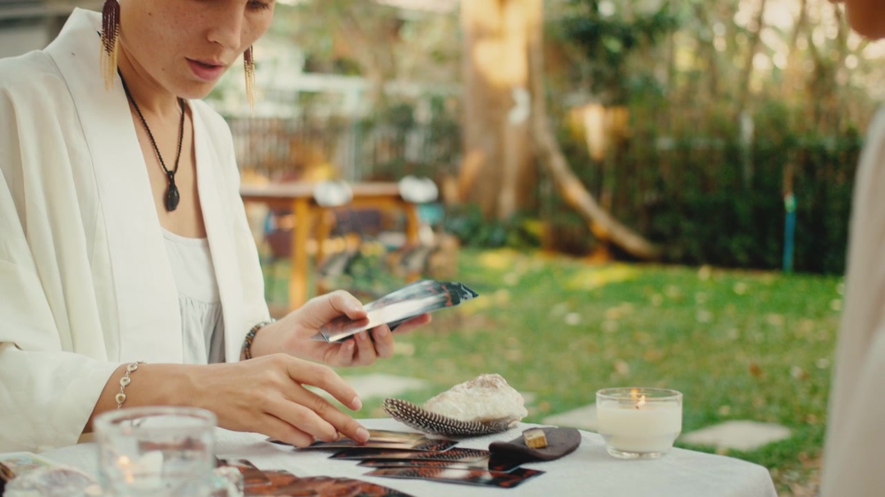 Woman Reading Tarot Cards During Outdoor Spiritual Session