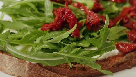 arugula bruschetta with sun-dried tomatoes