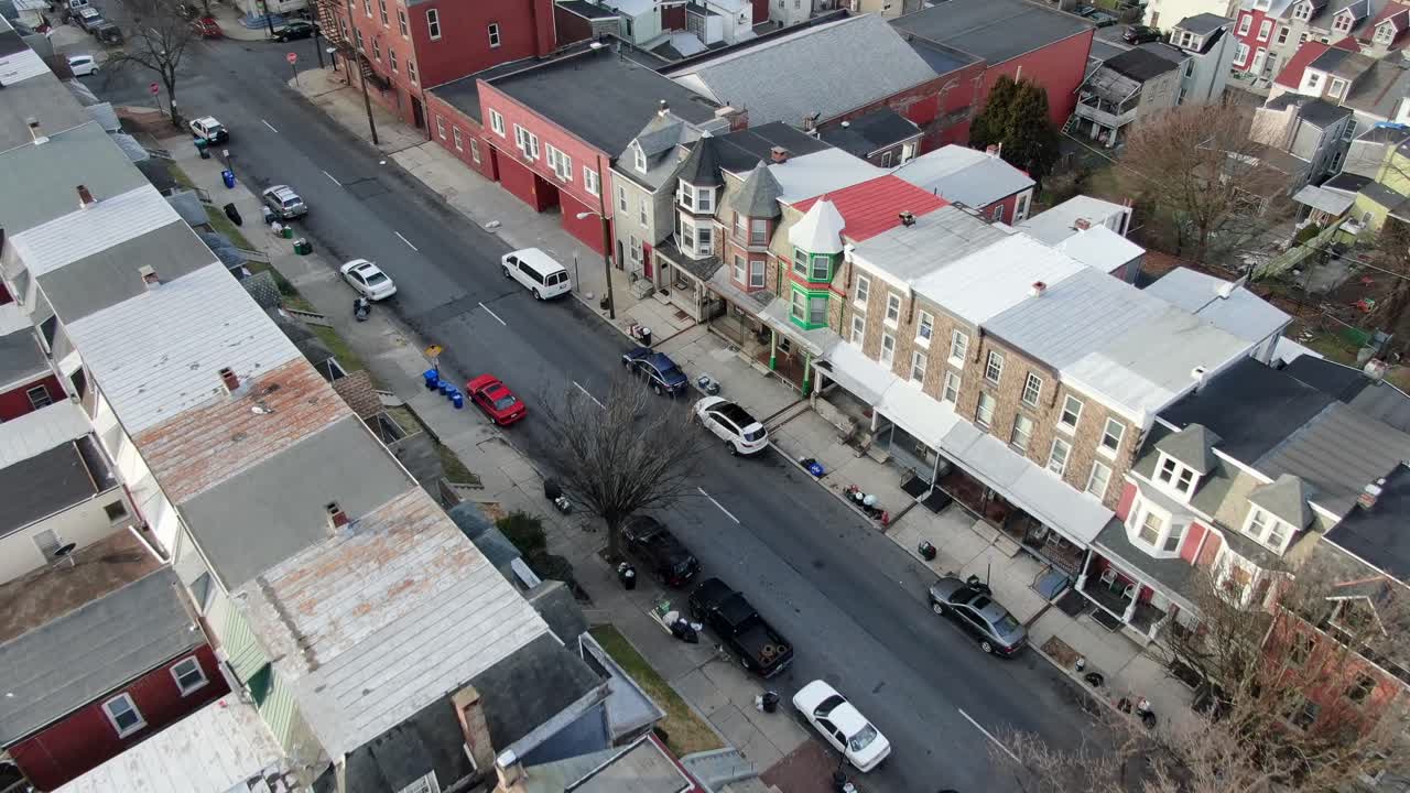 Urban poverty, low income housing, subsidized welfare recipient homes in US city, illegal immigration, high real estate property taxes theme