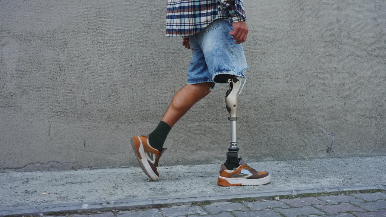 Man with Prosthetic Leg Walking