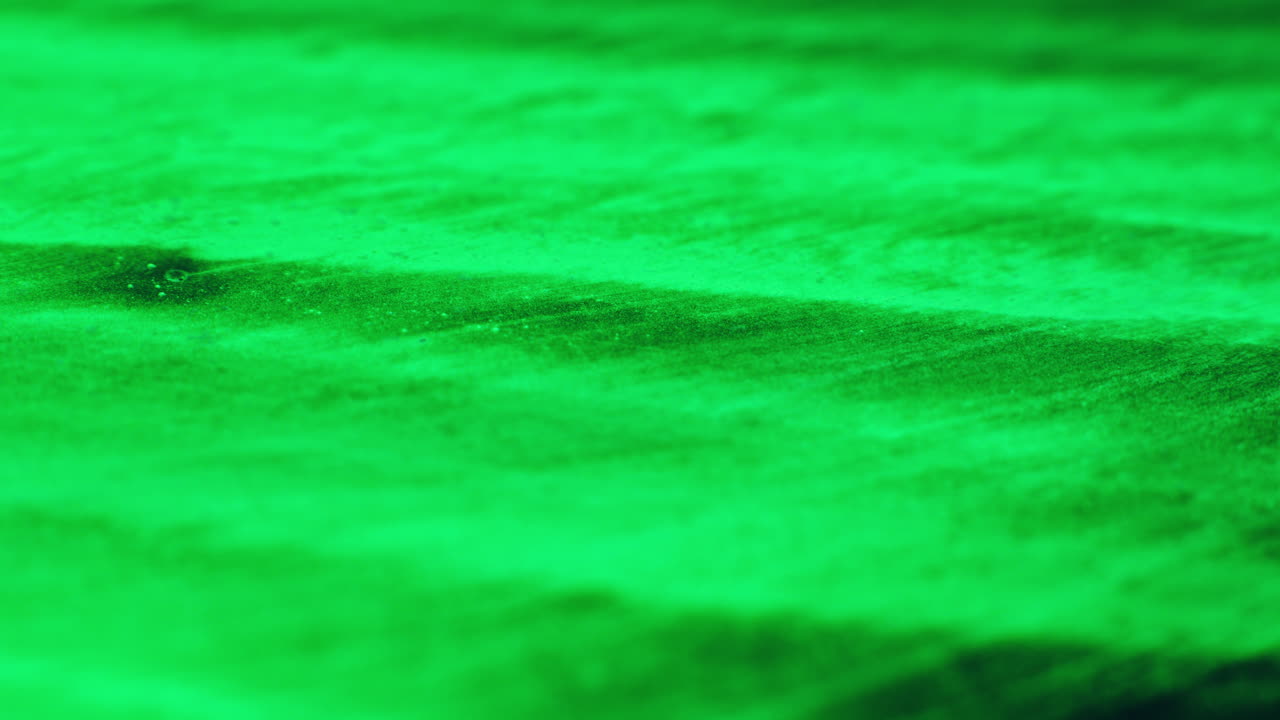 Colourful, organic, liquids macro shots buzzing and flowing