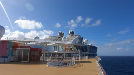 luxury cruise ship huge smoke stacks with smoke blowing out, sailing in middle of the ocean | cruise ship chimney blowing out smoke video background