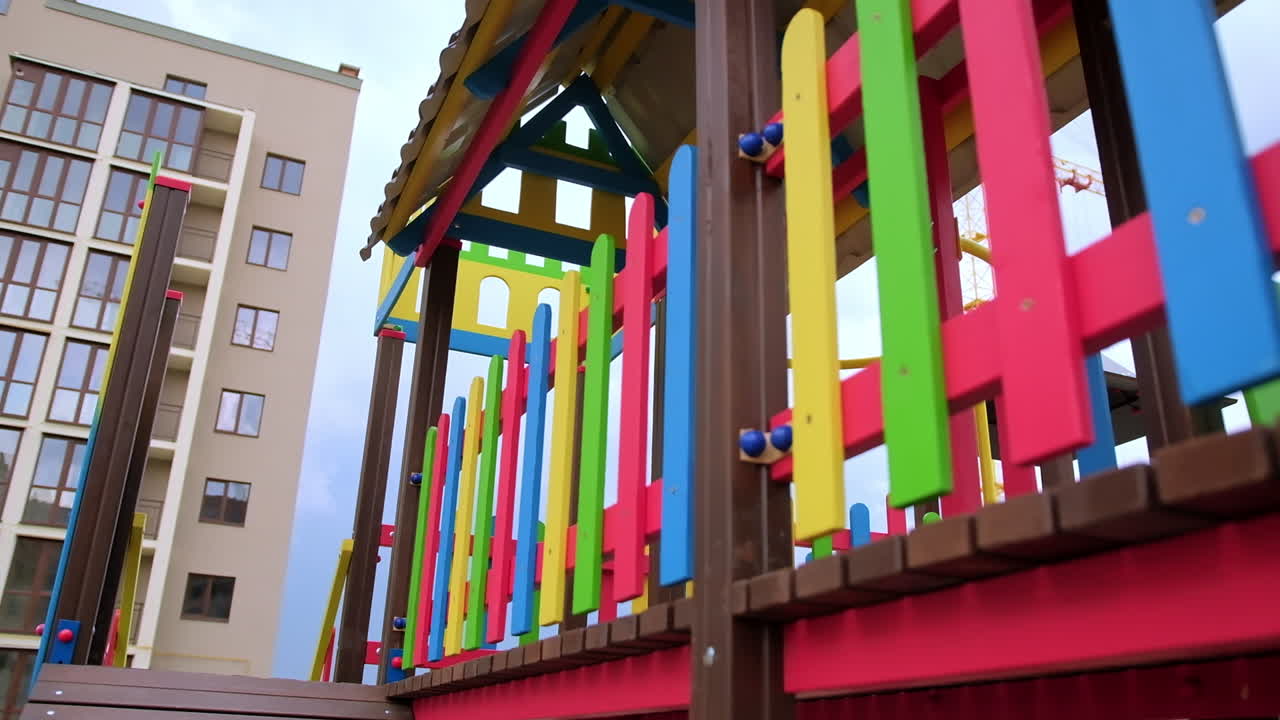 Colorful Playground in front of an Apartment Building