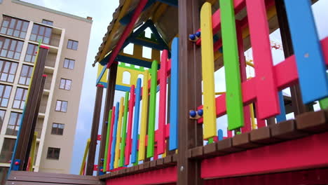 colorful playground in front of an apartment building