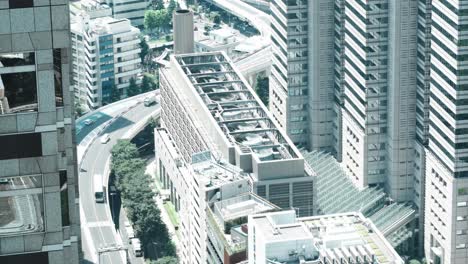 4k cinematic footage of a japanese highway and the ventilation systeme of a rooftop in tokyo