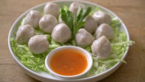 boiled fish balls with spicy dipping sauce