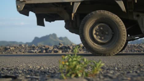 truck driving along vietnamese country road