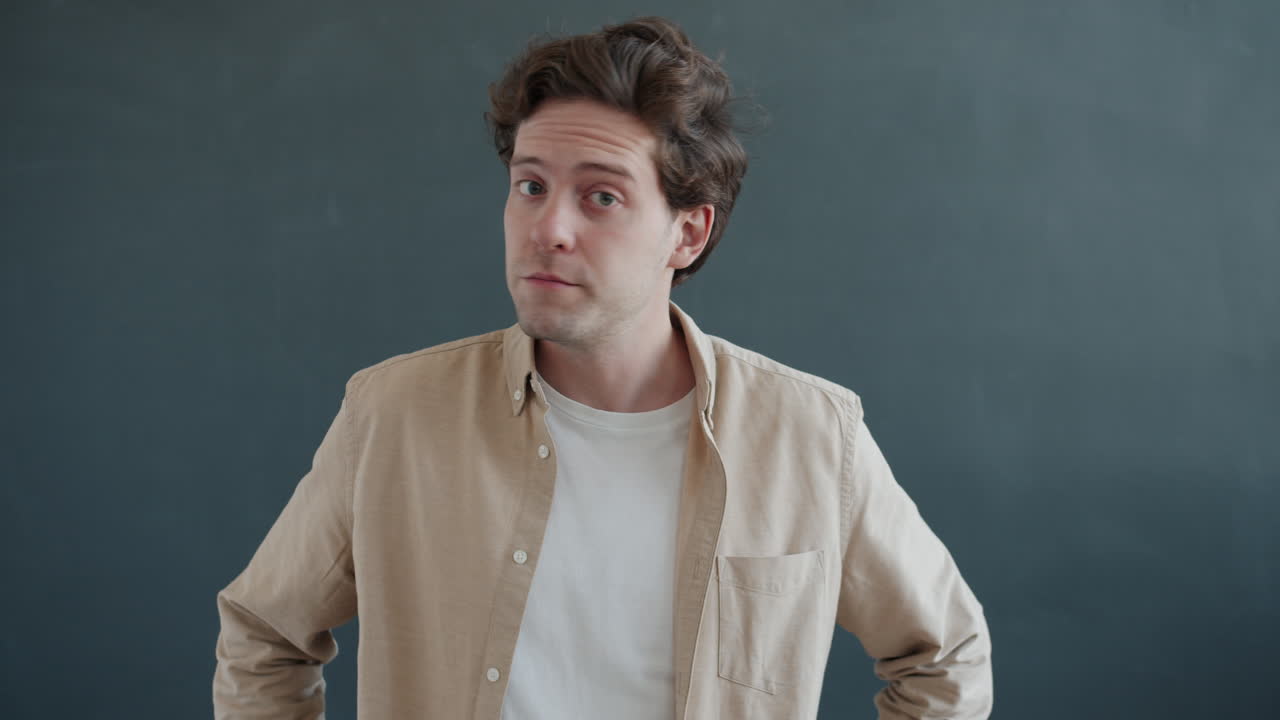 Man Expressing Surprise and Disapproval