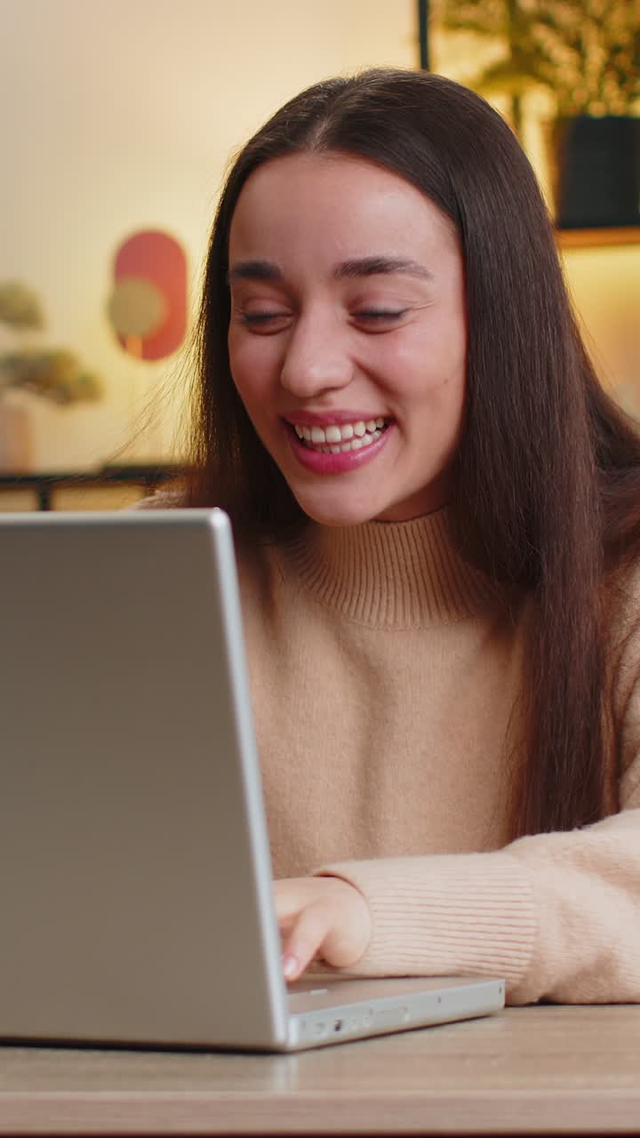 Amazed shocked caucasian woman use laptop computer receive good news message victory celebrate win