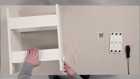 how to assemble a two-tier white shelf