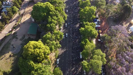 People-walking-along-Buenos-Aires-streets-after-final-victory-of-soccer-World-Cup-2022,-Argentina