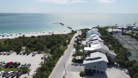 boca grande aerial with boaters streaming by the warm coastal waters of the gulf of mexico, florida