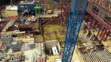 aerial view of construction site with crane
