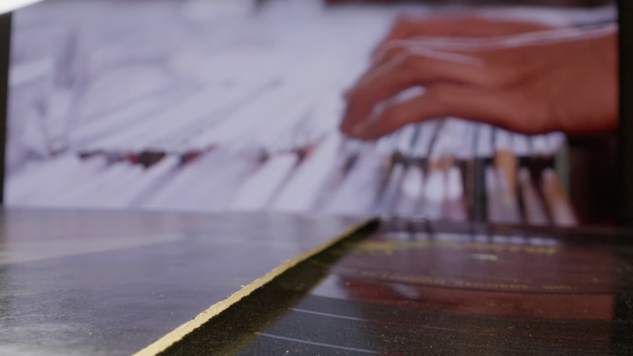 Male hands searching paper files with video moving forward