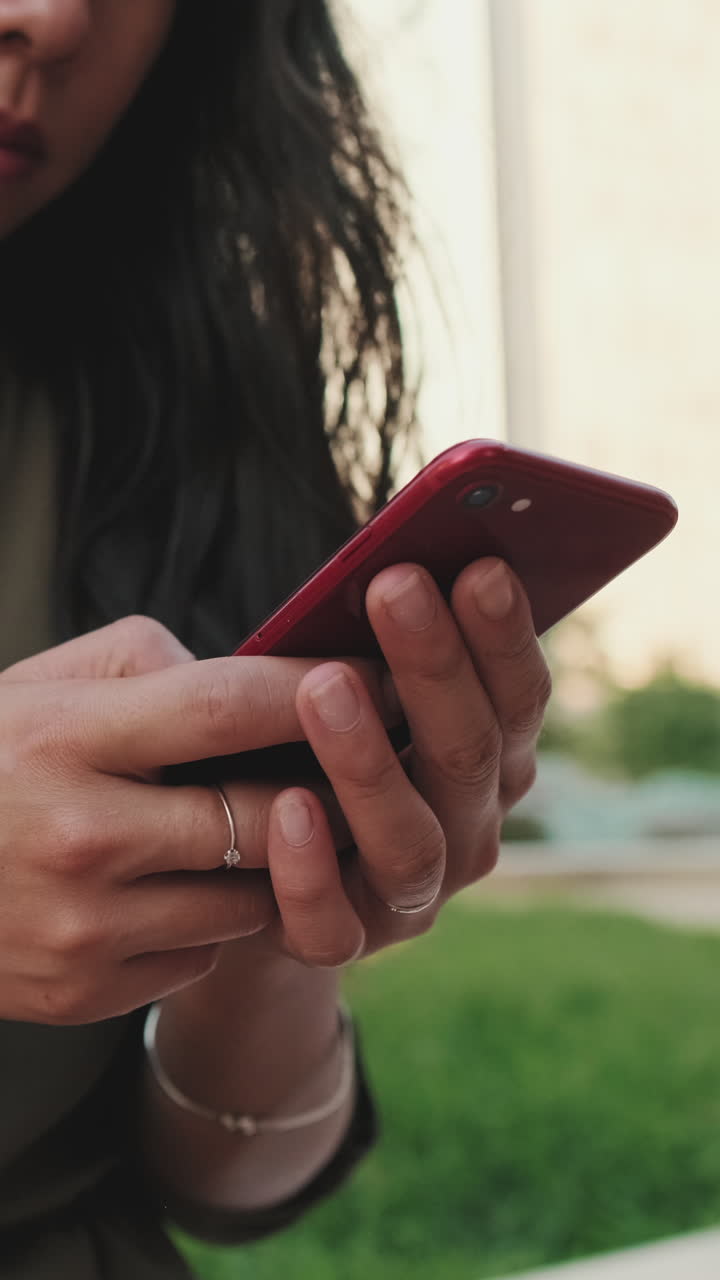 A woman using her smartphone
