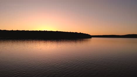 beautiful morning sunrise over calm lake