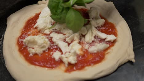 making pizza margherita