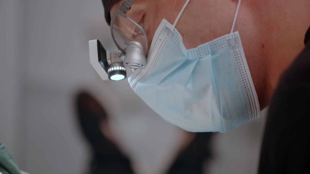 Dentist Examining a Patient